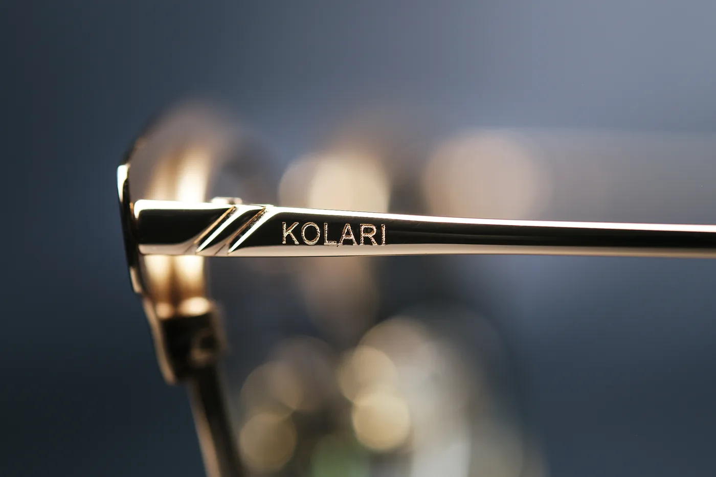 Close-up of the KOLARI engraving on a titanium temple arm